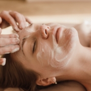 a woman having a facial treatment